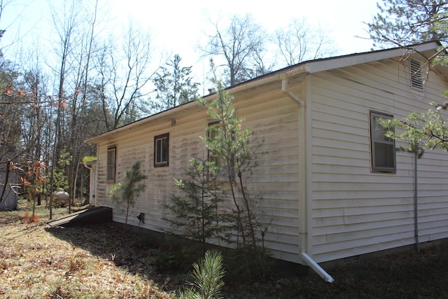 2032 W Oak Rd, Luzerne, MI 48636 - view of property exterior featuring crawl space