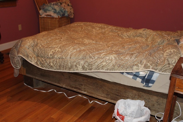 2032 W Oak Rd, Luzerne, MI 48636 - bedroom with wood finished floors