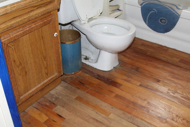 2032 W Oak Rd, Luzerne, MI 48636 - bathroom with wood-type flooring and toilet