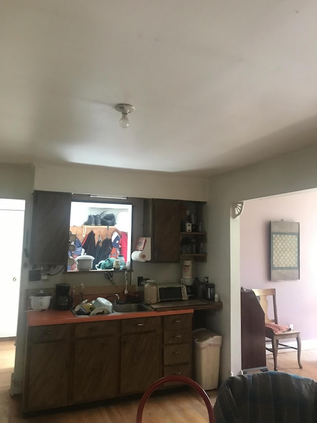 2032 W Oak Rd, Luzerne, MI 48636 - living area featuring light wood finished floors
