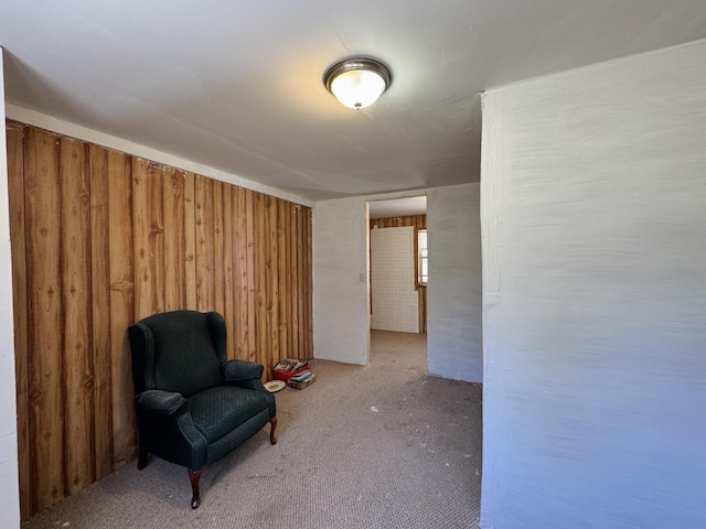 1654 Opland Rd, Gladwin, MI 48624 - sitting room with wooden walls and carpet