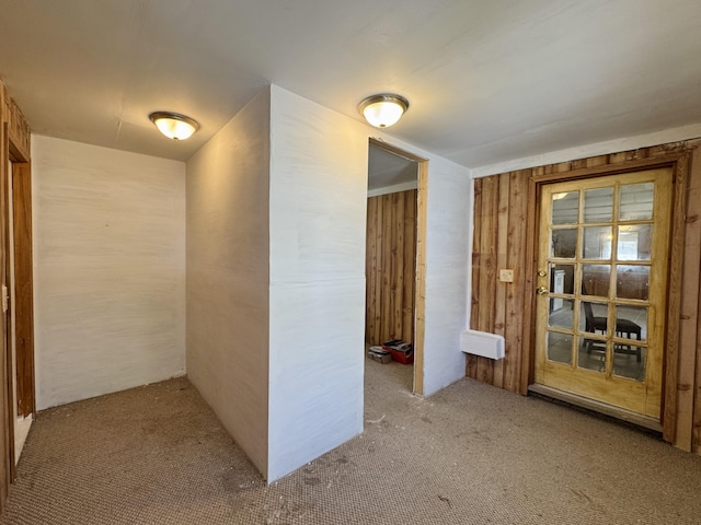 1654 Opland Rd, Gladwin, MI 48624 - hallway featuring carpet floors and wooden walls