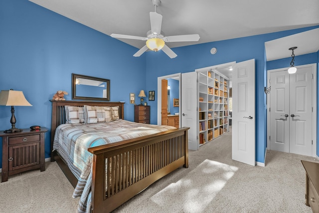 343 Crystal Ln, Roscommon, MI 48653 - bedroom with carpet flooring, ceiling fan, a closet, and connected bathroom