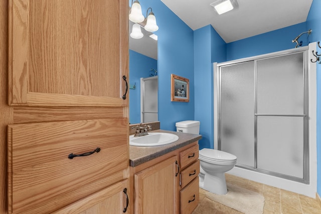 343 Crystal Ln, Roscommon, MI 48653 - bathroom with a stall shower, vanity, and tile patterned floors