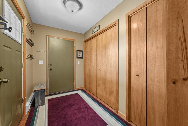 343 Crystal Ln, Roscommon, MI 48653 - doorway to outside with baseboards