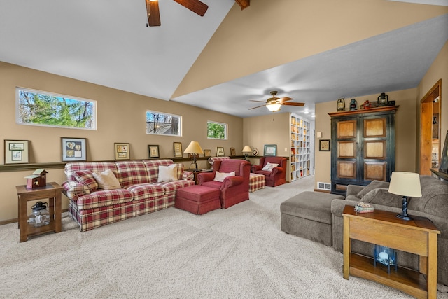 343 Crystal Ln, Roscommon, MI 48653 - carpeted living room featuring a ceiling fan, beamed ceiling, and high vaulted ceiling