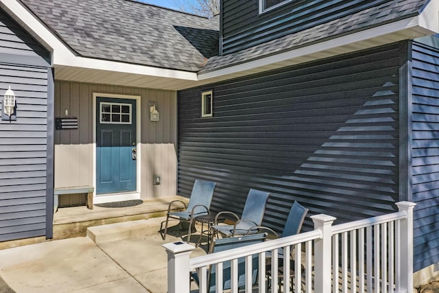 343 Crystal Ln, Roscommon, MI 48653 - view of exterior entry with roof with shingles