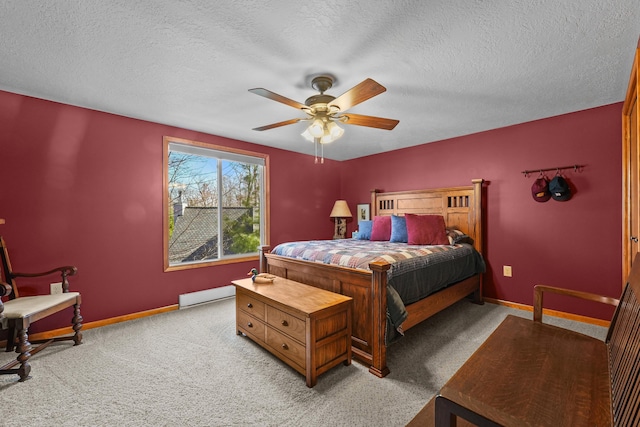 343 Crystal Ln, Roscommon, MI 48653 - bedroom featuring carpet floors, a textured ceiling, a baseboard heating unit, and a ceiling fan