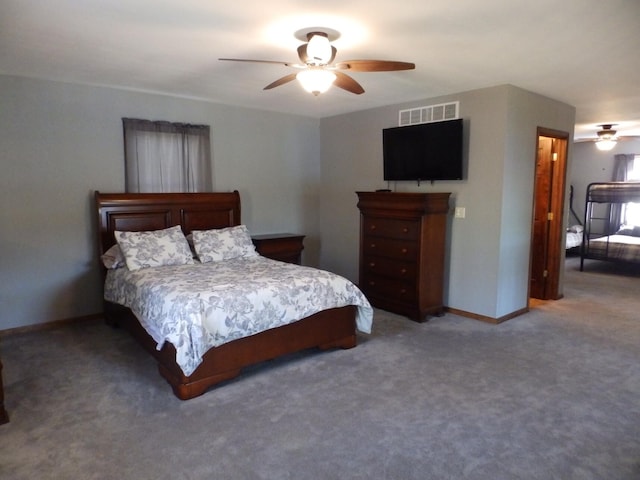 7928 Blueberry Ln, Johannesburg, MI 49751 - carpeted bedroom with baseboards and a ceiling fan