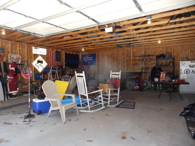 7928 Blueberry Ln, Johannesburg, MI 49751 - garage featuring a garage door opener