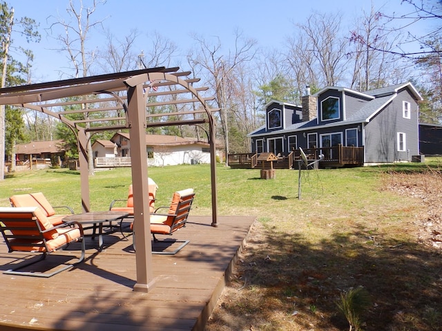 7928 Blueberry Ln, Johannesburg, MI 49751 - view of green lawn featuring a deck