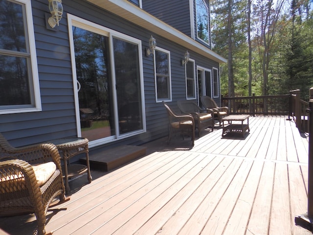 7928 Blueberry Ln, Johannesburg, MI 49751 - deck with an outdoor hangout area