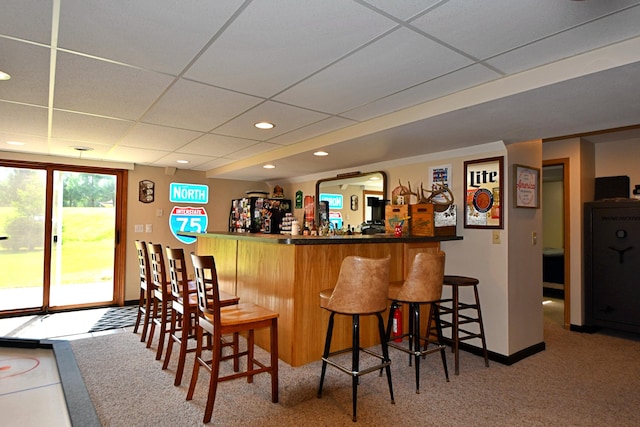 4930 Warrington Way, Gladwin, MI 48624 - indoor dry bar featuring a paneled ceiling, carpet, recessed lighting, and baseboards