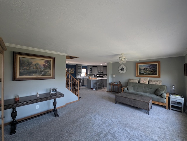 9367 Clewley Rd, Lachine, MI 49753 - living area featuring light carpet, crown molding, ceiling fan, and a textured ceiling