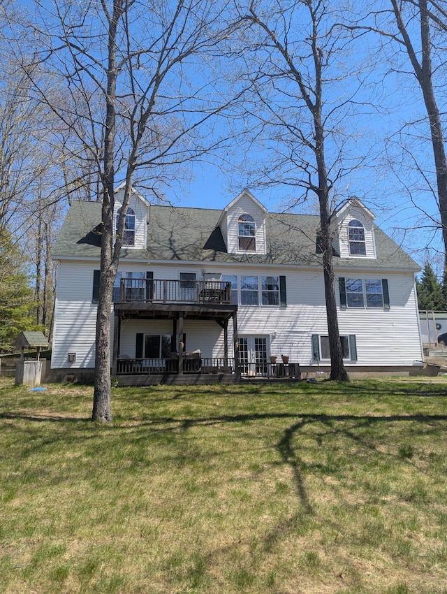 9367 Clewley Rd, Lachine, MI 49753 - back of property with a deck and a yard