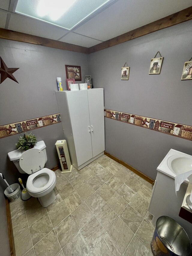 20417 State St, Onaway, MI 49765 - bathroom with toilet and baseboards