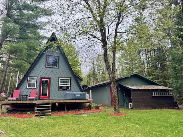 2733 Timberlane Trl, Grayling, MI 49738 - view of front of property featuring a deck and a front yard