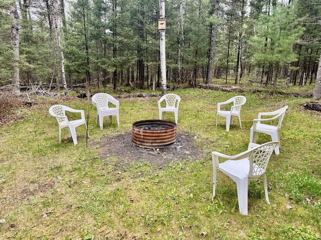 2733 Timberlane Trl, Grayling, MI 49738 - view of yard featuring an outdoor fire pit
