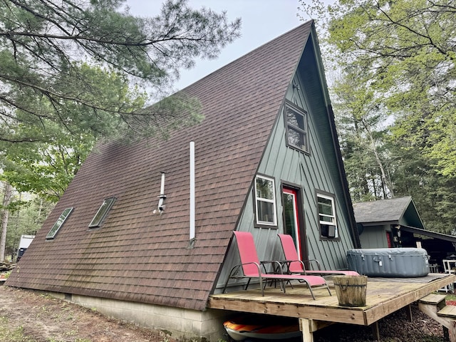 2733 Timberlane Trl, Grayling, MI 49738 - view of side of home with a deck and roof with shingles