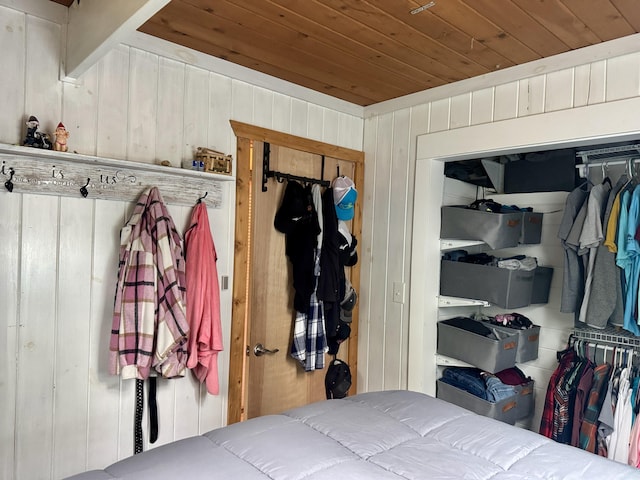 2733 Timberlane Trl, Grayling, MI 49738 - bedroom featuring wood ceiling and wooden walls