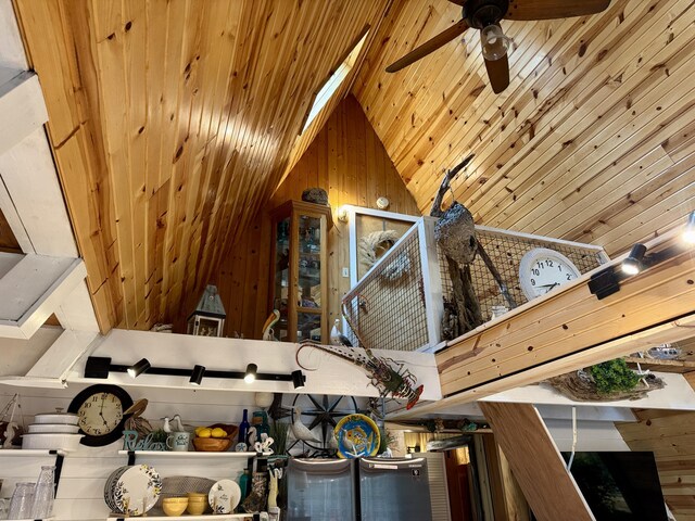 2733 Timberlane Trl, Grayling, MI 49738 - detailed view of a ceiling fan, wood walls, and wooden ceiling