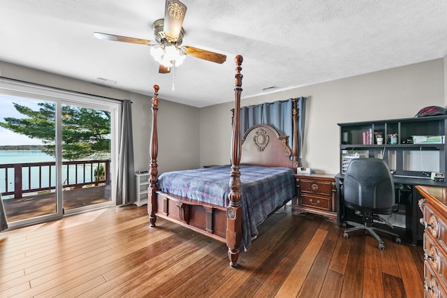bedroom featuring access to exterior, hardwood / wood-style flooring, a textured ceiling, a ceiling fan, and an office area