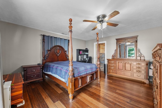 bedroom with hardwood / wood-style floors and ceiling fan