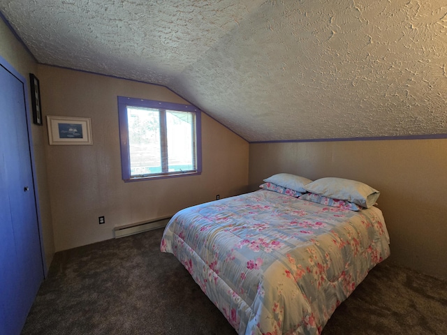 2623 W Dixon Lake Dr, Gaylord, MI 49735 - bedroom featuring a baseboard heating unit, a textured ceiling, lofted ceiling, and carpet floors