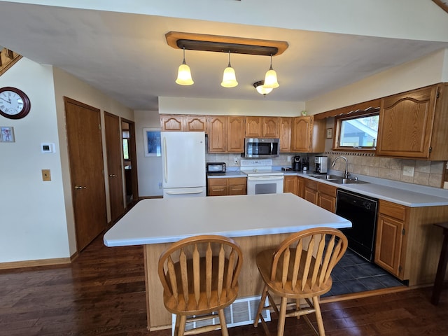 2623 W Dixon Lake Dr, Gaylord, MI 49735 - kitchen with black appliances, a sink, dark wood-type flooring, and tasteful backsplash