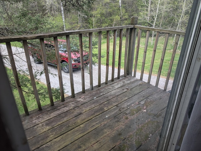 20563 S M32, Hillman, MI 49746 - wooden deck with a wooded view and a yard