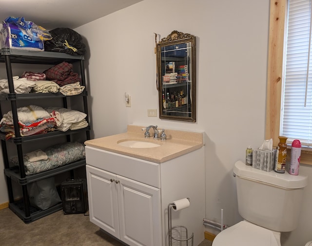 20563 S M32, Hillman, MI 49746 - half bathroom featuring toilet and vanity