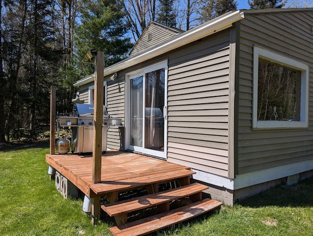 20563 S M32, Hillman, MI 49746 - wooden deck with a lawn and grilling area