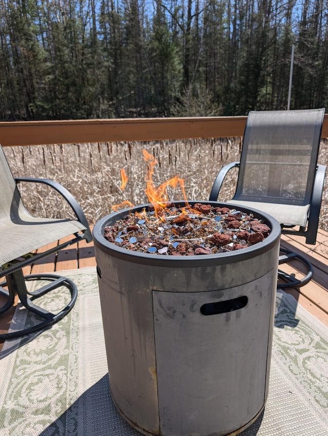 20563 S M32, Hillman, MI 49746 - view of patio / terrace featuring an outdoor fire pit