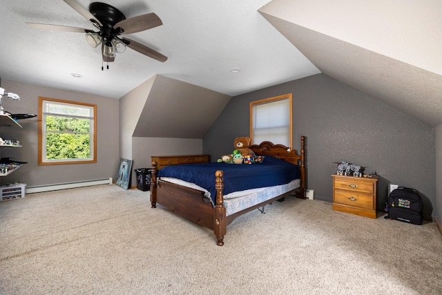 11758 Woodview Trl, Gaylord, MI 49735 - bedroom with a baseboard heating unit, carpet floors, vaulted ceiling, and a ceiling fan