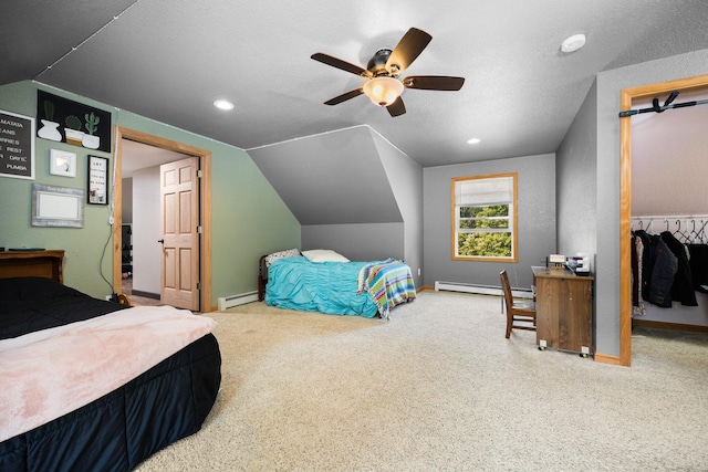 11758 Woodview Trl, Gaylord, MI 49735 - carpeted bedroom with a baseboard radiator, lofted ceiling, baseboards, recessed lighting, and a ceiling fan