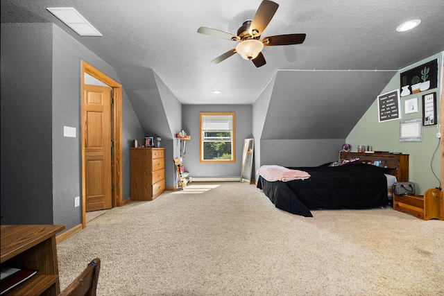 11758 Woodview Trl, Gaylord, MI 49735 - bedroom with carpet, a textured ceiling, baseboards, a baseboard heating unit, and ceiling fan