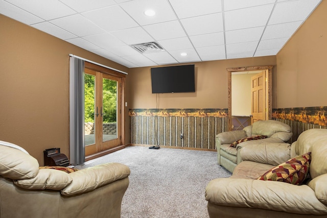 11758 Woodview Trl, Gaylord, MI 49735 - carpeted living area featuring wainscoting and a drop ceiling