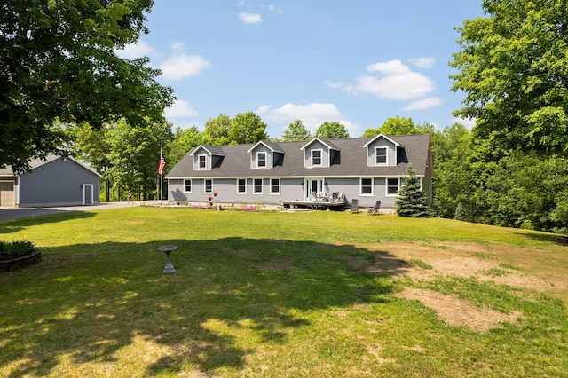 11758 Woodview Trl, Gaylord, MI 49735 - view of front of home featuring a front yard and a wooden deck