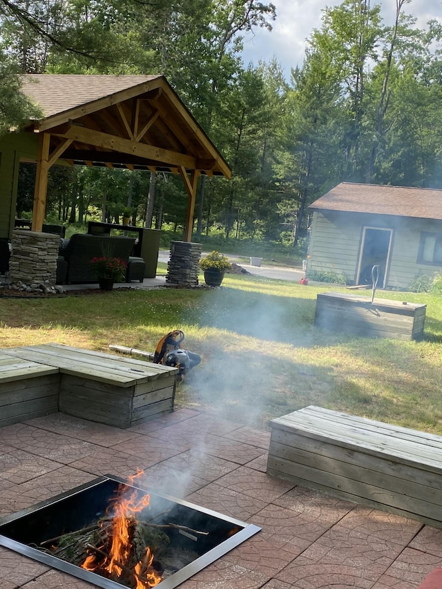 6475 W Legner Trl, Grayling, MI 49738 - view of property's community featuring a gazebo, a patio area, and a yard