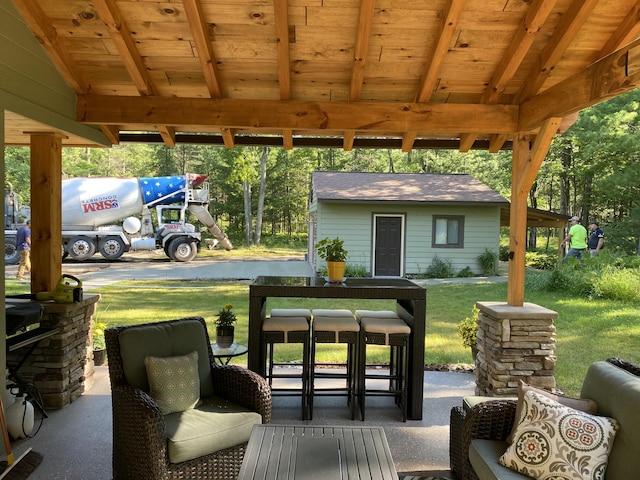 6475 W Legner Trl, Grayling, MI 49738 - view of patio featuring an outdoor structure