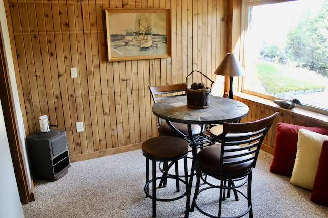6475 W Legner Trl, Grayling, MI 49738 - carpeted dining space featuring wood walls