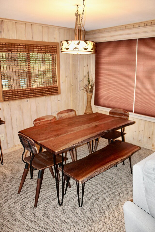 6475 W Legner Trl, Grayling, MI 49738 - dining room with wood walls and carpet flooring