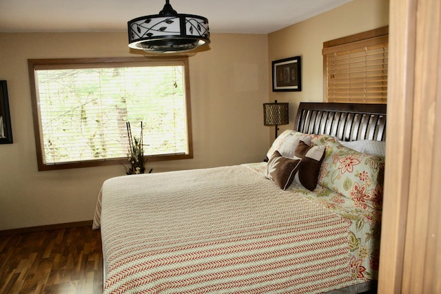 6475 W Legner Trl, Grayling, MI 49738 - bedroom with wood finished floors and baseboards