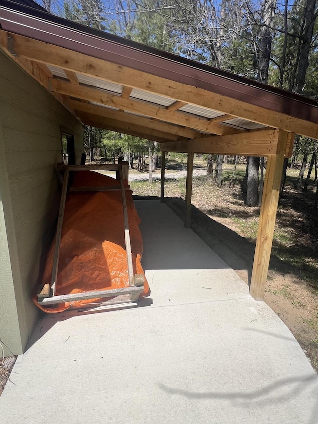 6475 W Legner Trl, Grayling, MI 49738 - view of patio featuring a carport