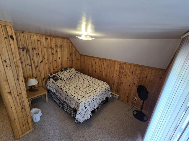 7912 Millecoquin Trl, Gaylord, MI 49735 - carpeted bedroom featuring wood walls, lofted ceiling, and a baseboard radiator