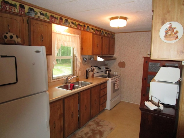 541 Ranch Rd, Indian River, MI 49749 - kitchen featuring white appliances, a sink, wallpapered walls, brown cabinets, and light countertops