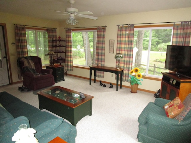 541 Ranch Rd, Indian River, MI 49749 - living room with baseboards, carpet floors, and ceiling fan