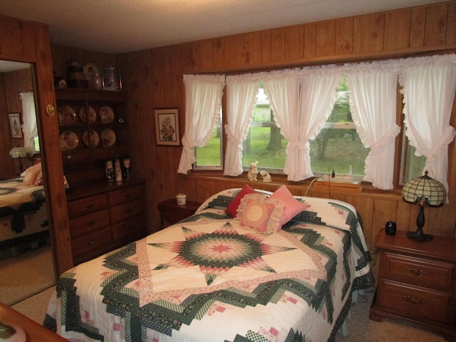541 Ranch Rd, Indian River, MI 49749 - bedroom with wood walls and multiple windows