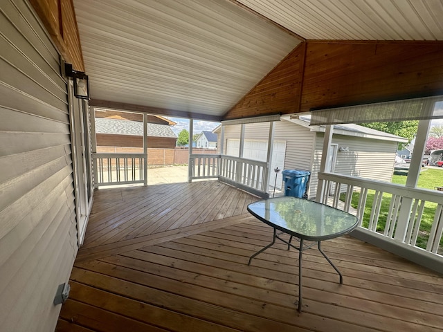deck with an outbuilding