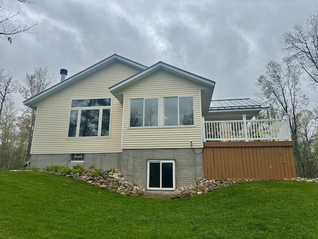 870 Dalton Dr, Rose City, MI 48654 - rear view of house featuring a yard and a wooden deck